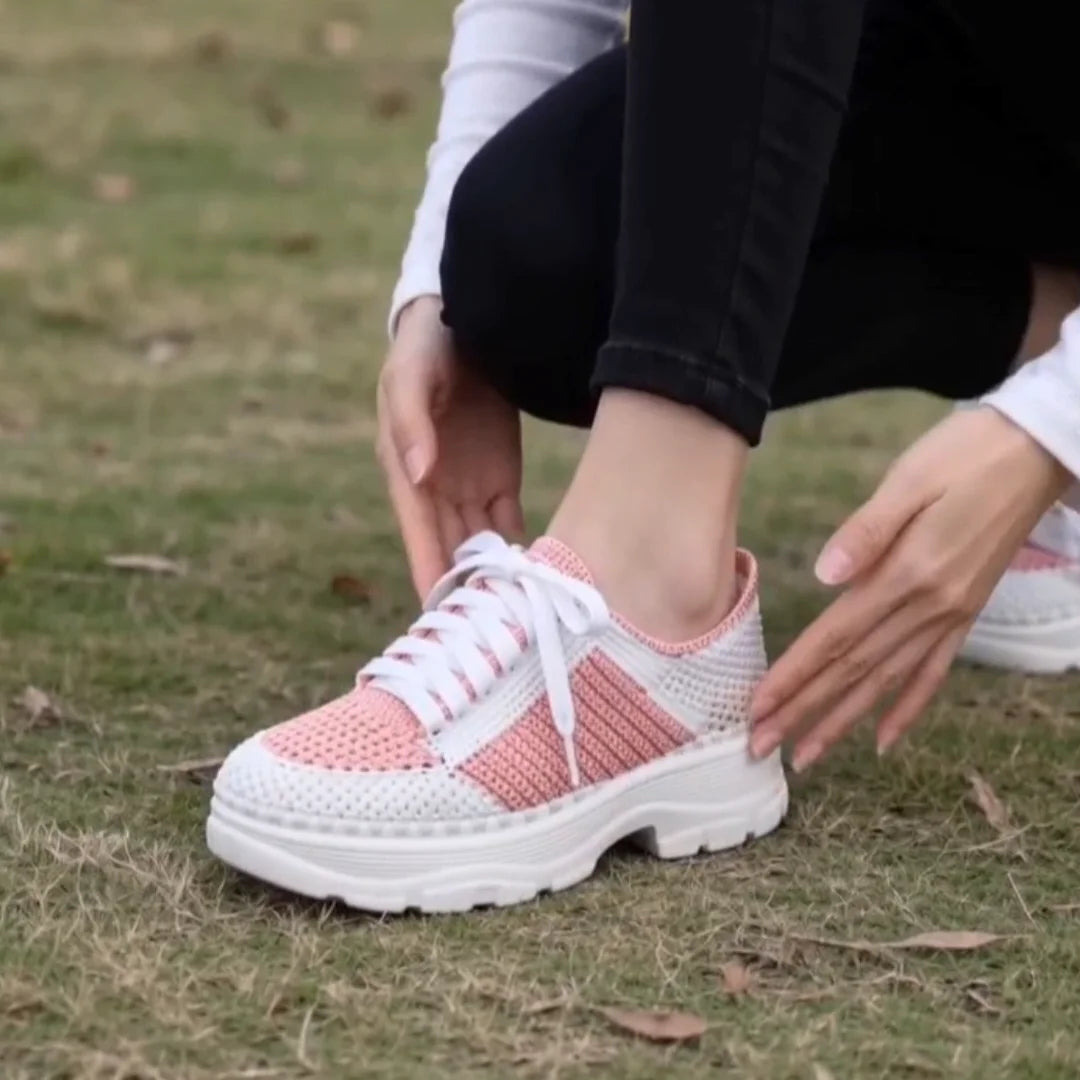 Woman wearing pink handmade crochet sneakers outdoors — Xiaorong Handmade
